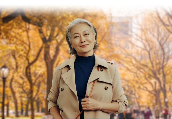 Smiling middle-aged woman. Not real patient.